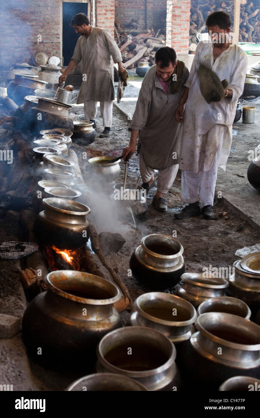 A Waza or cook in the Kashmiri traditions cooks and prepares food for a