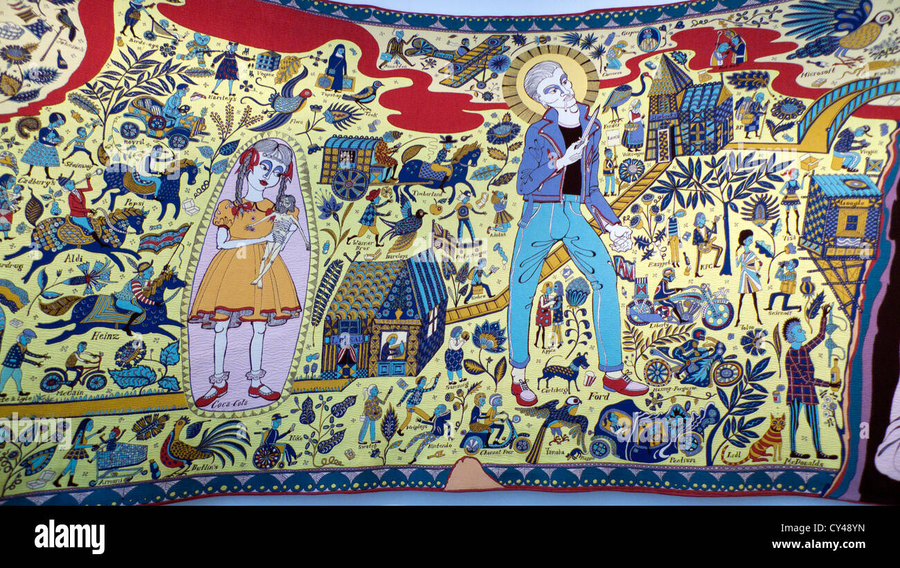 Grayson Perry Walthamstow Tapestry detail of child with doll figure and youth with switchblade knife at exhibition in London England UK   KATHY DEWIT Stock Photo
