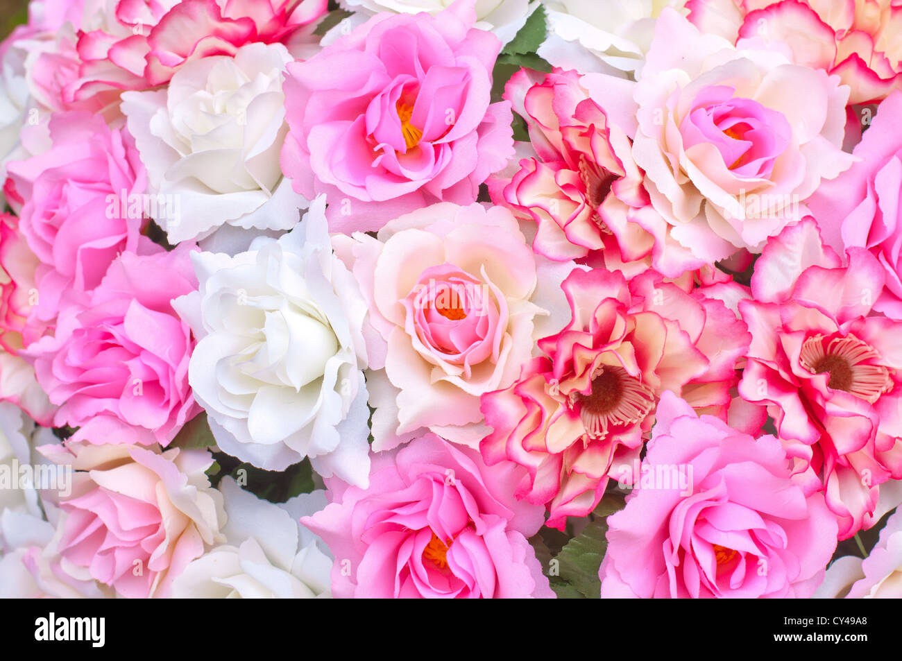 Artificial flowers background Stock Photo Alamy