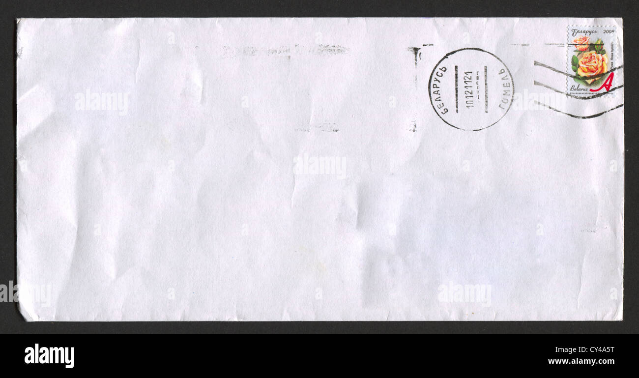 BELARUS - CIRCA 2012: Mailing envelope with postage stamps dedicated to Rosa hibnida, circa 2012. Stock Photo
