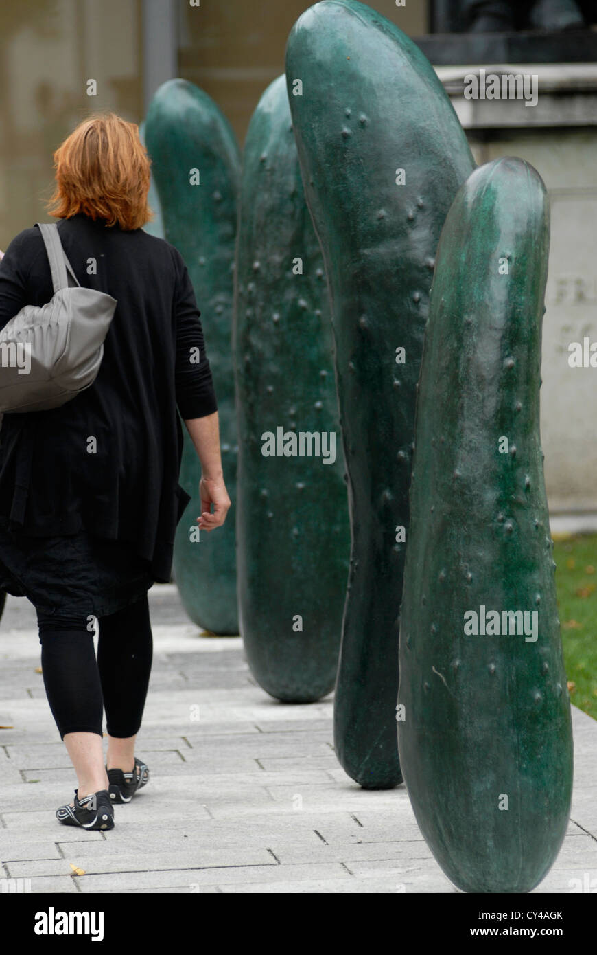 Woman, Modern, sculpture Gurken Erwin Wurm, Cucumber, Salzburg, Austria,  Europe, Art Stock Photo