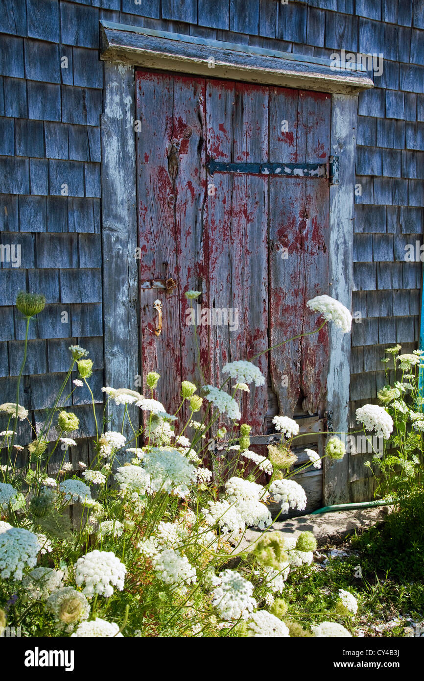 An old weathered door at the Frying Pan Gallery in Wellfleet, MA Stock Photo