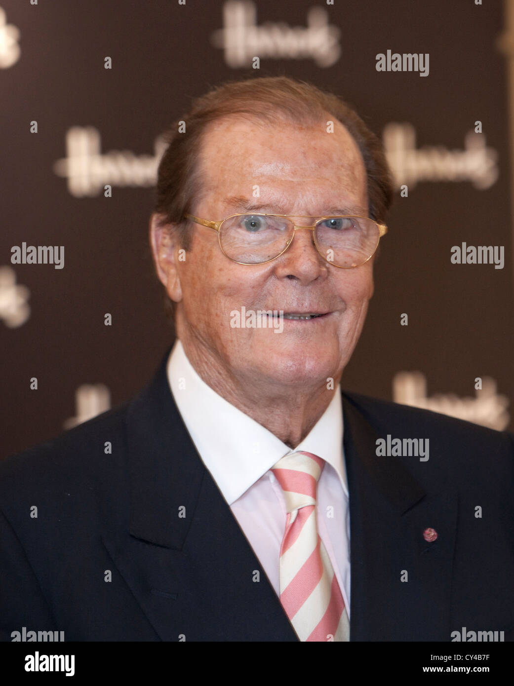 roger moore , actor, signs copies of his new book 'bond on bond' at ...