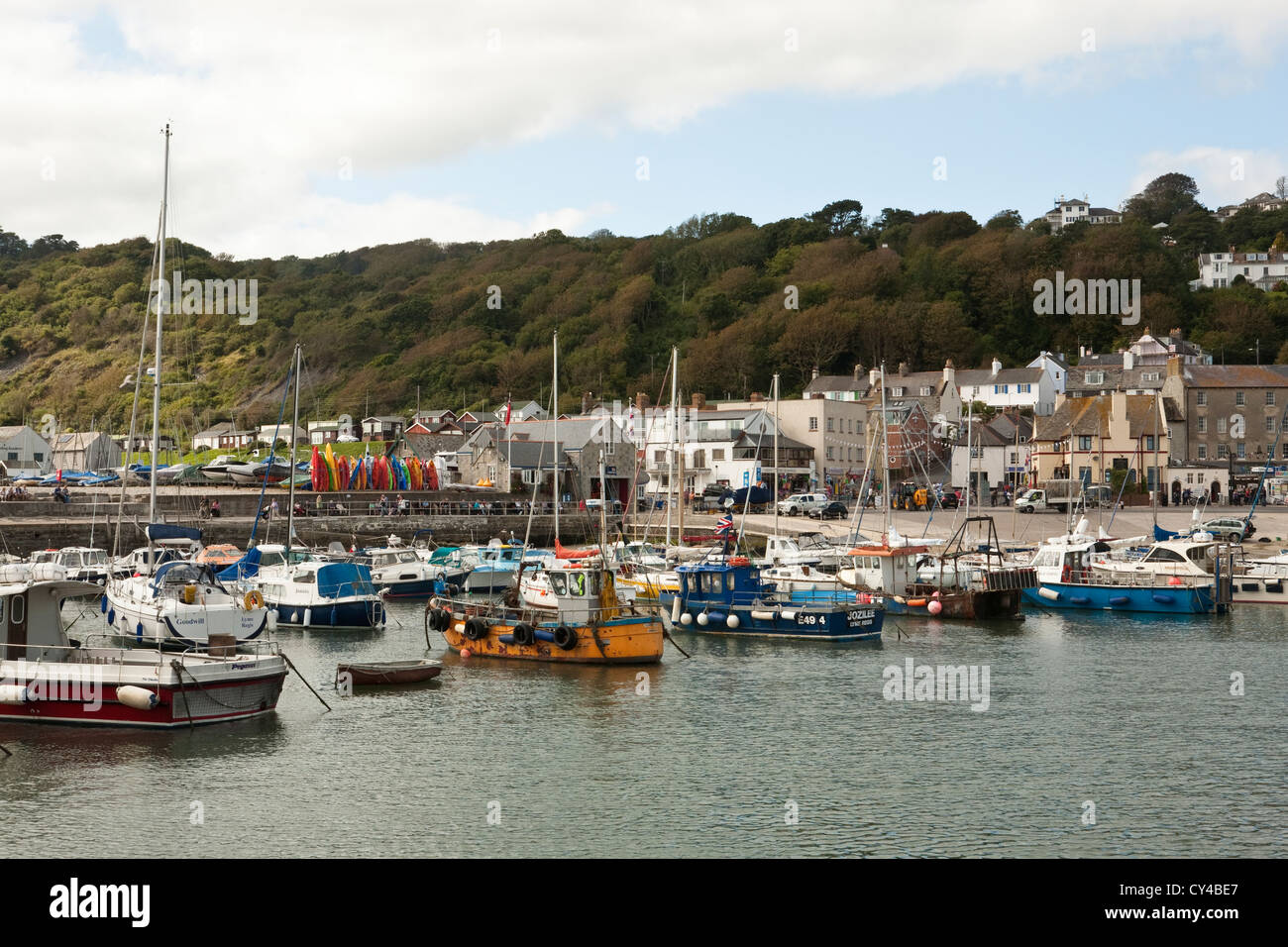 boats in the harbour on a summer day in Lyme Regis Stock Photo