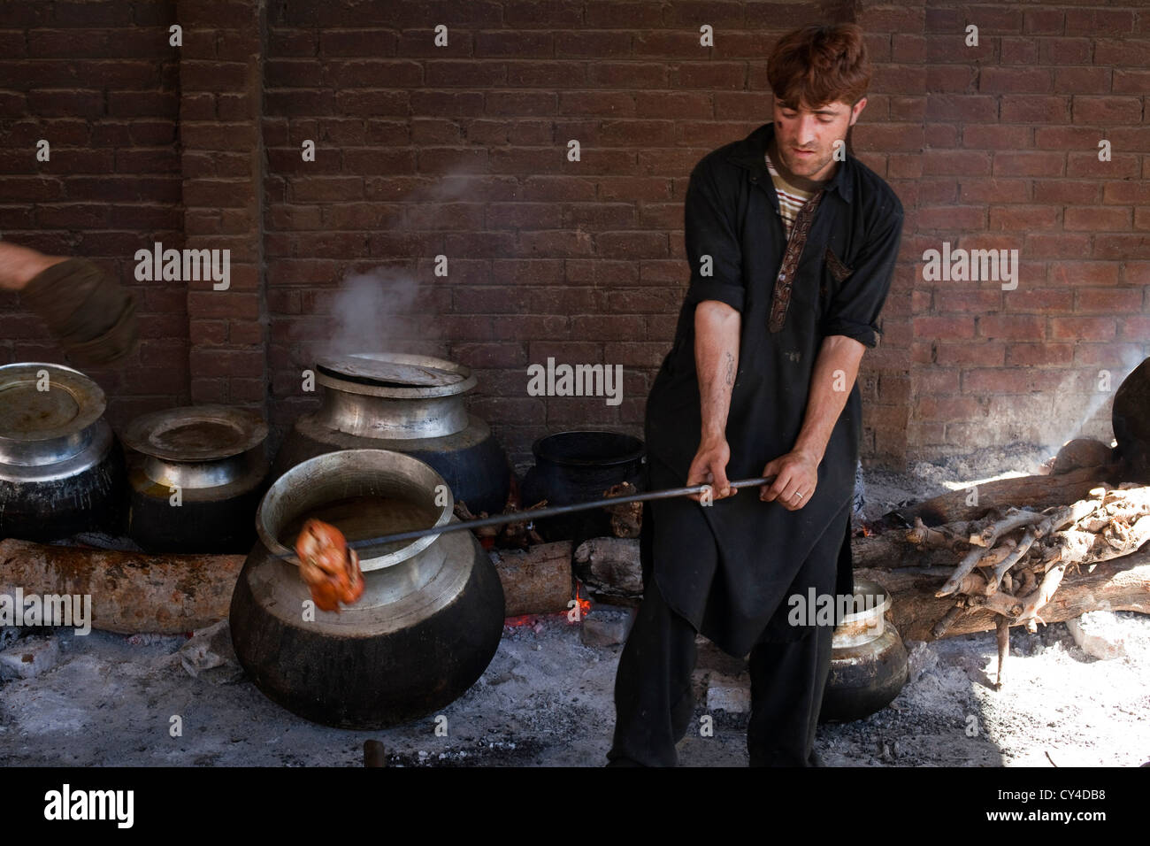 Wazas, traditional Kashmiri cooks, prepare a Wazwan a Kashmiri feast