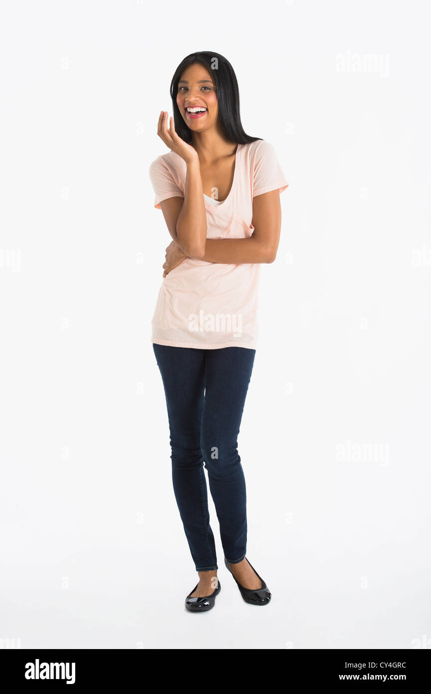 Portrait of woman smiling, studio shot Stock Photo - Alamy