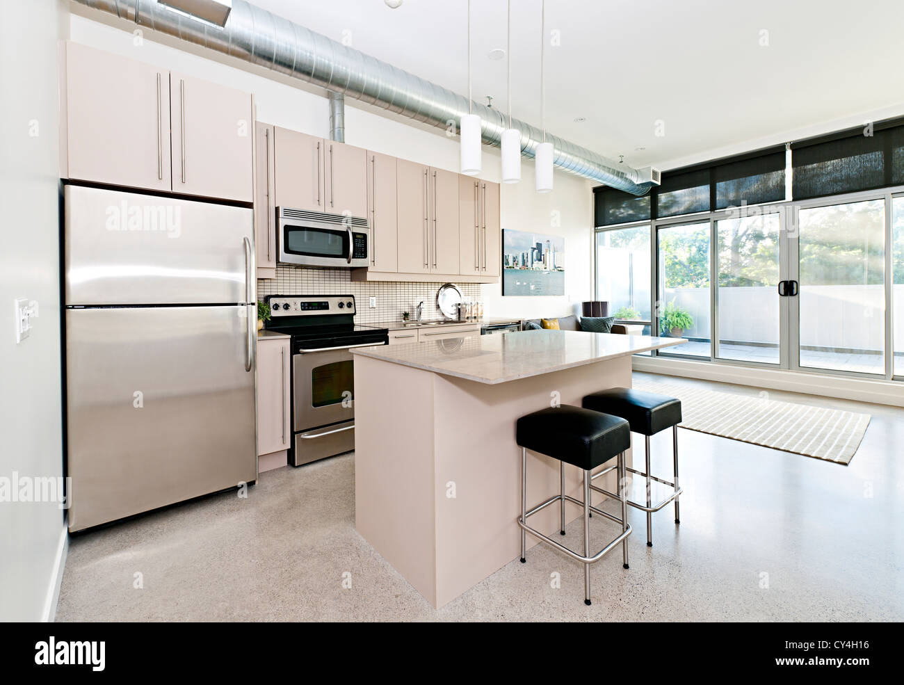 Kitchen and living room of loft apartment - artwork from photographer portfolio Stock Photo