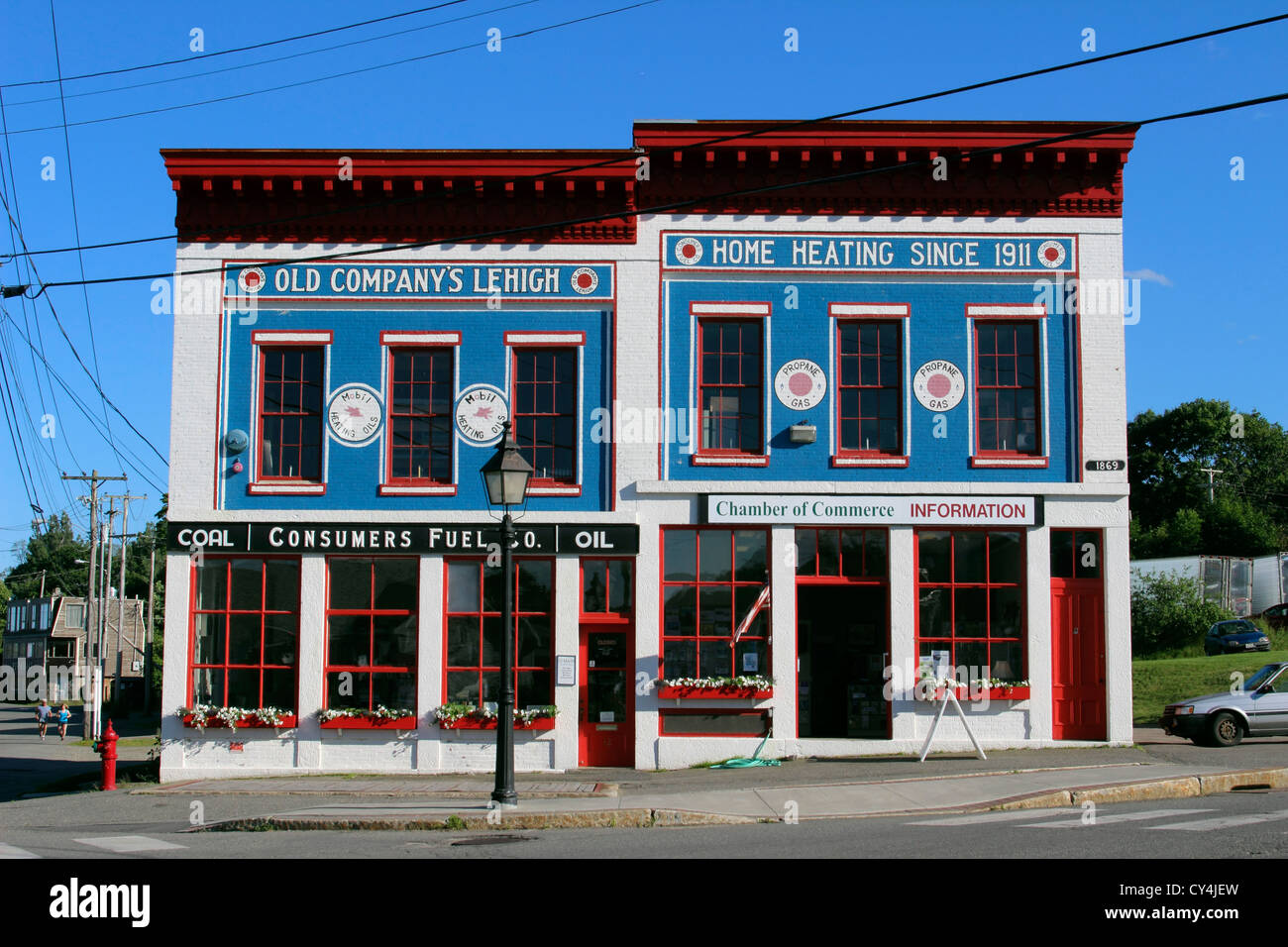 Maine Coast New England USA Belfast Harbor painted facade old coal and oil company shop Stock Photo