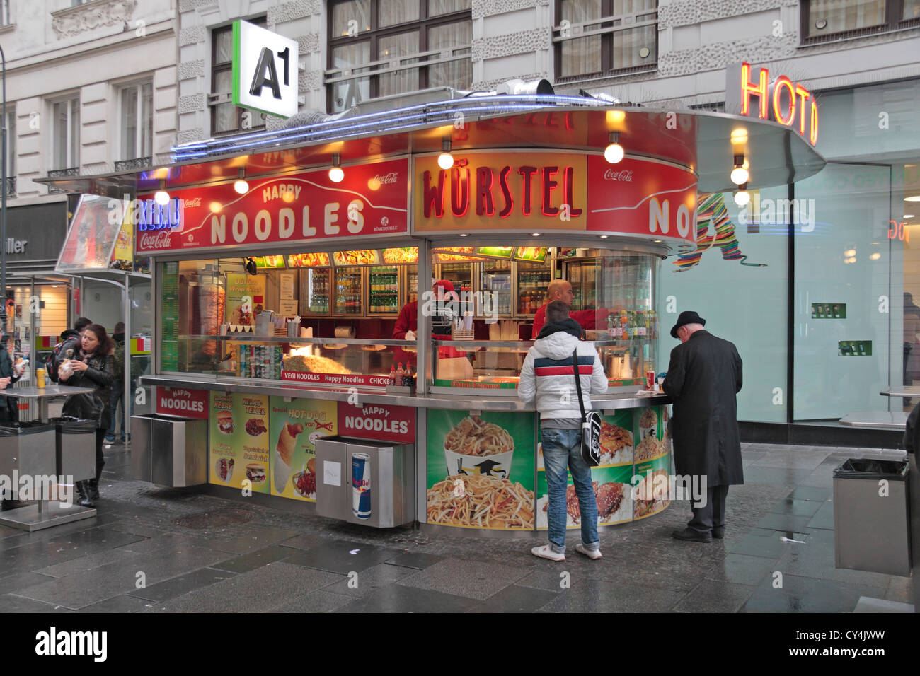 A Wurstel/hot dog and noodle fast food kiosk in Vienna, Austria. Stock Photo