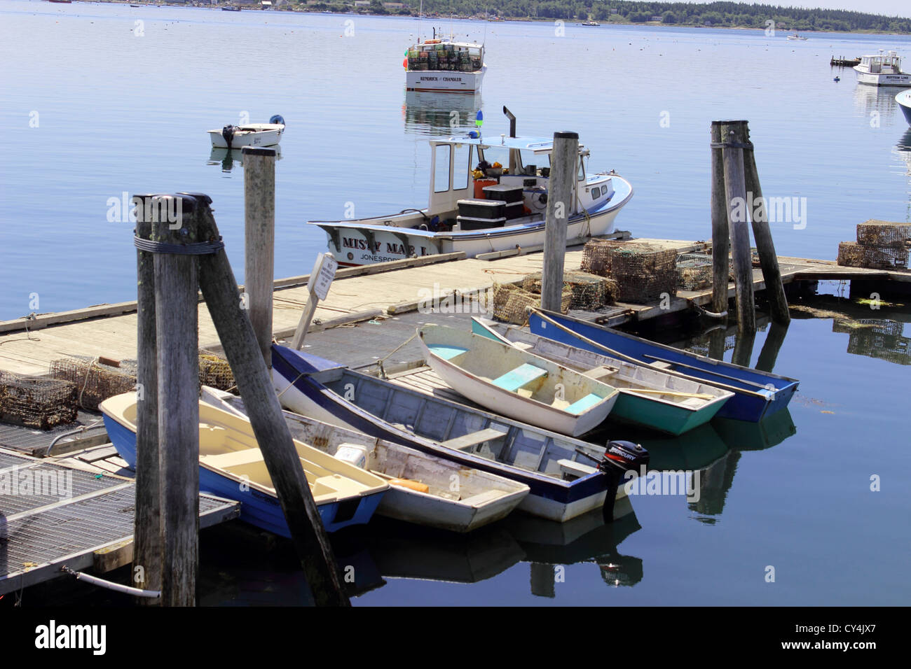 Maine Coast New England USA Jonesport small harbor with dingys Stock Photo