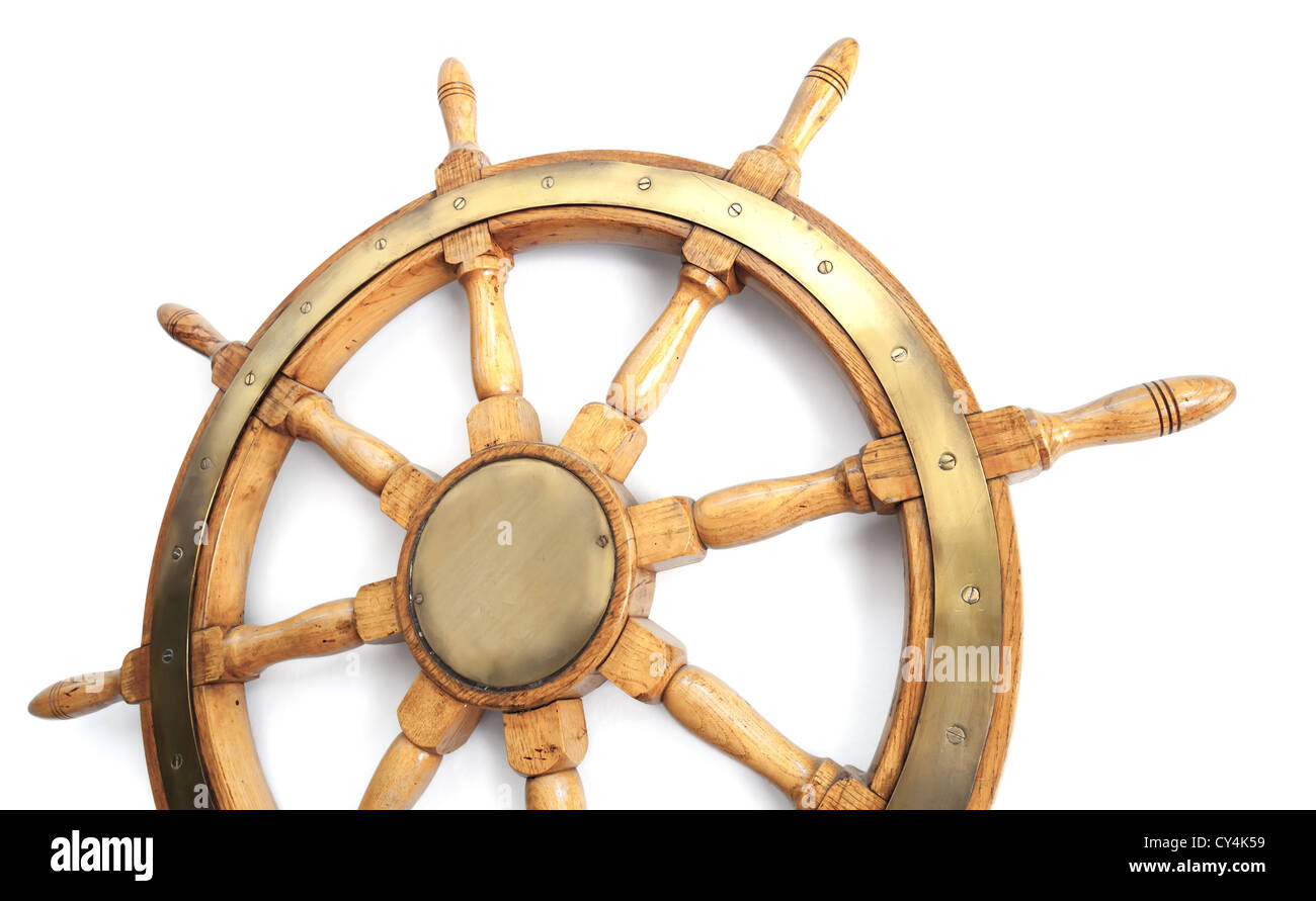 Old wooden steering wheel on white background Stock Photo