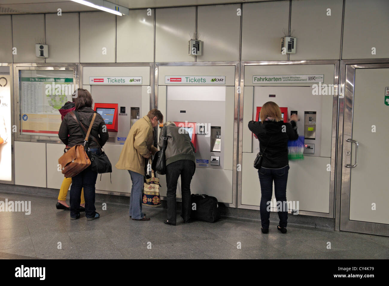 People using the automated ticket machines at a U-Bahn train station in Vienna, Austria. Stock Photo