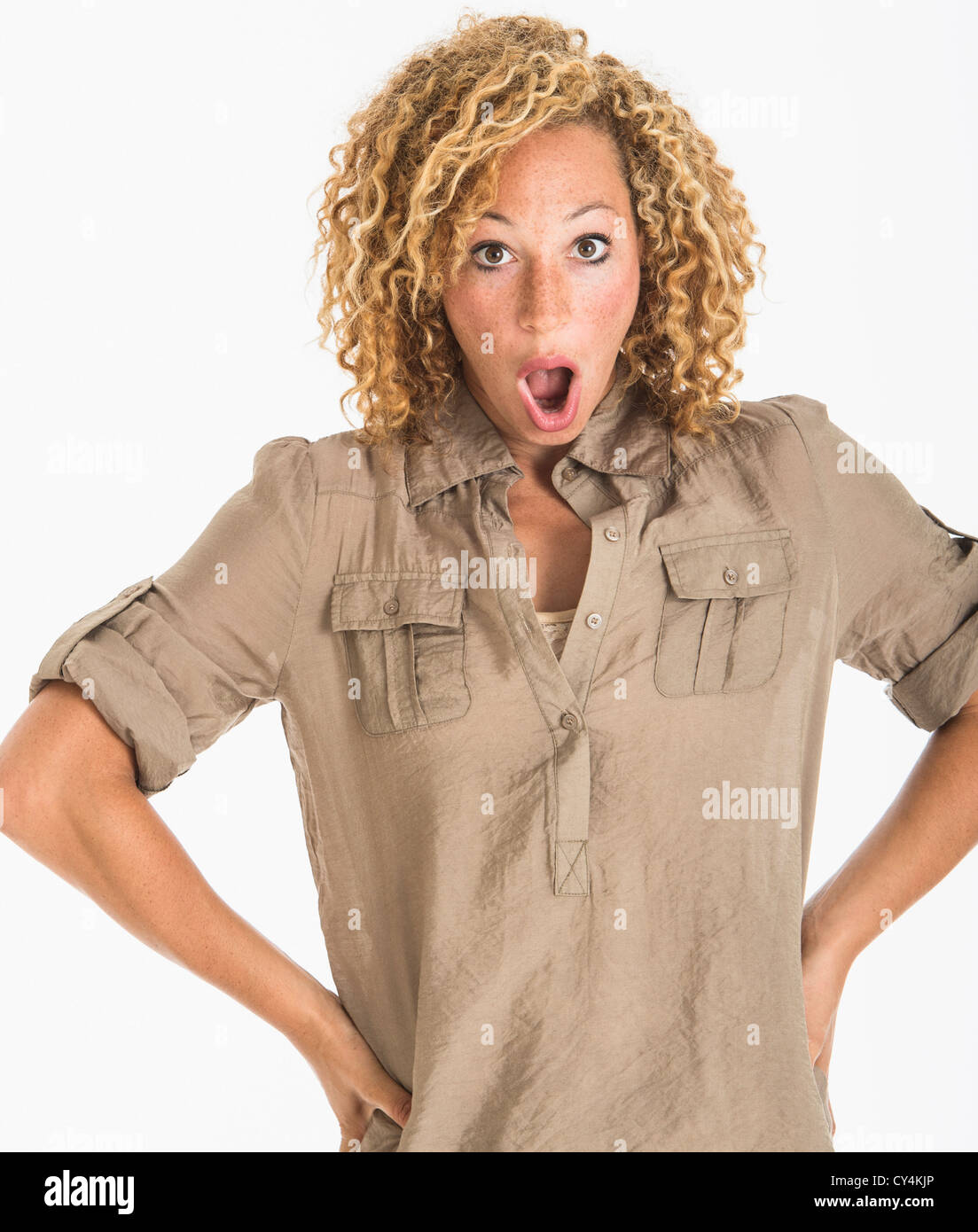 Surprised blonde woman standing mouth hi-res stock photography and ...