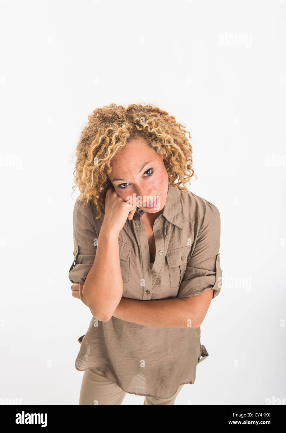 Portrait of young woman on white background, studio shot Stock Photo