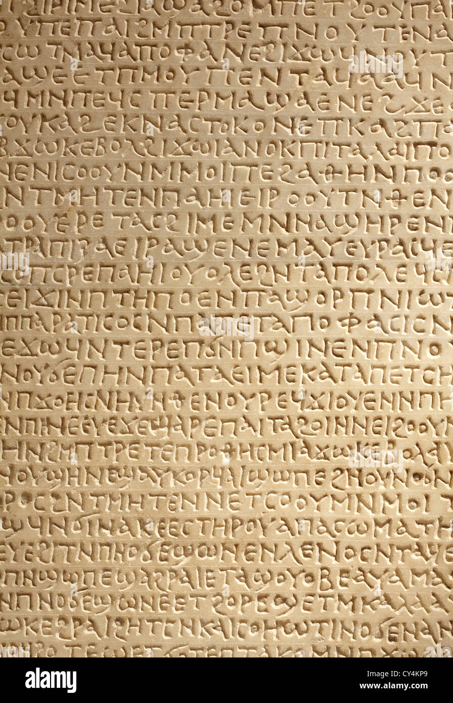 Ancient greek writing on stone background stock photo alamy