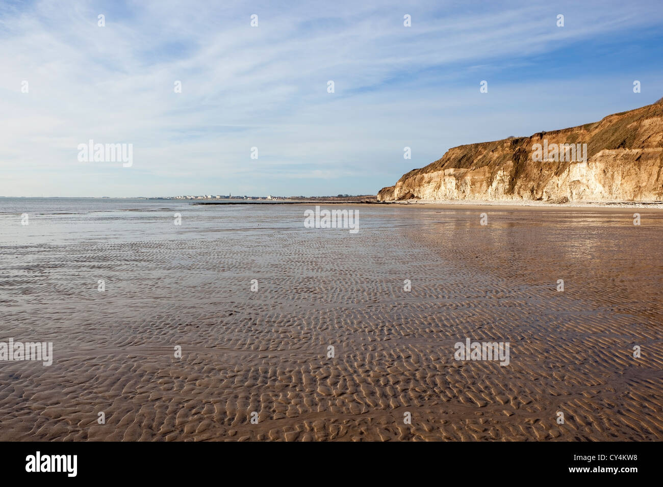 A view along the rippled sand beach at Dane's dyke, South towards the seaside town of Bridlington on Yorkshire's East coast Stock Photo