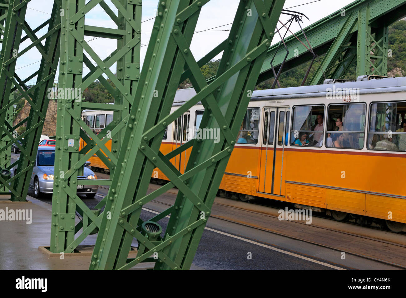 Trams and cars on the green zabadsag bridge over the river Danube in Budapest Stock Photo Alamy