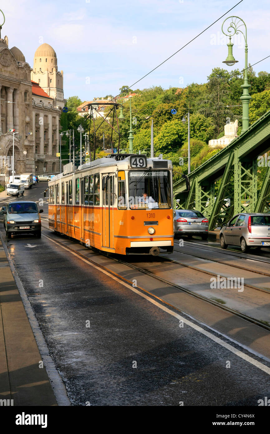 Trams and cars on the green zabadsag bridge over the river Danube in Budapest Stock Photo Alamy