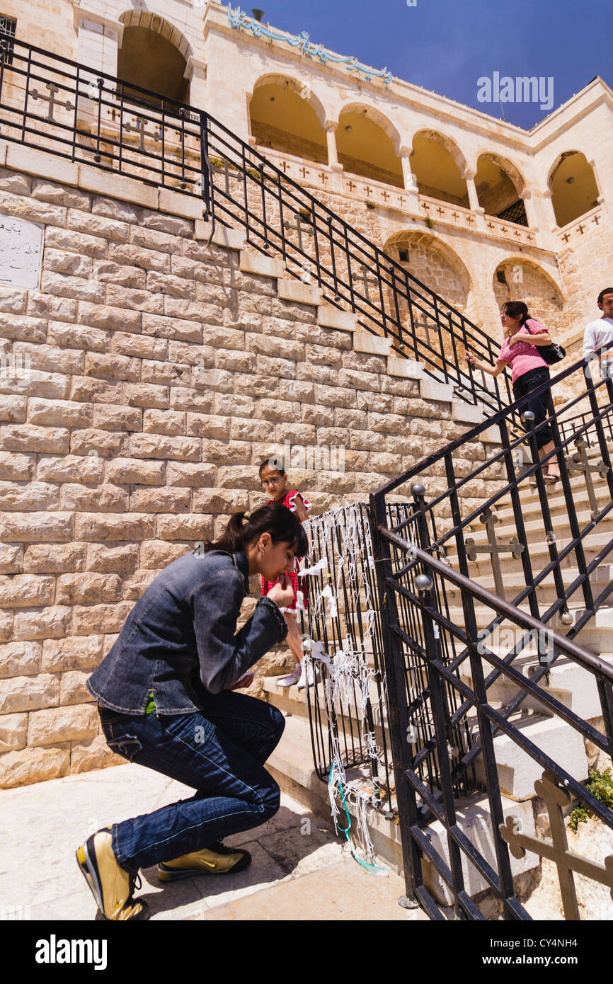 Young Arab Christian woman visiting the convent of Saidnaya. Syria Stock Photo