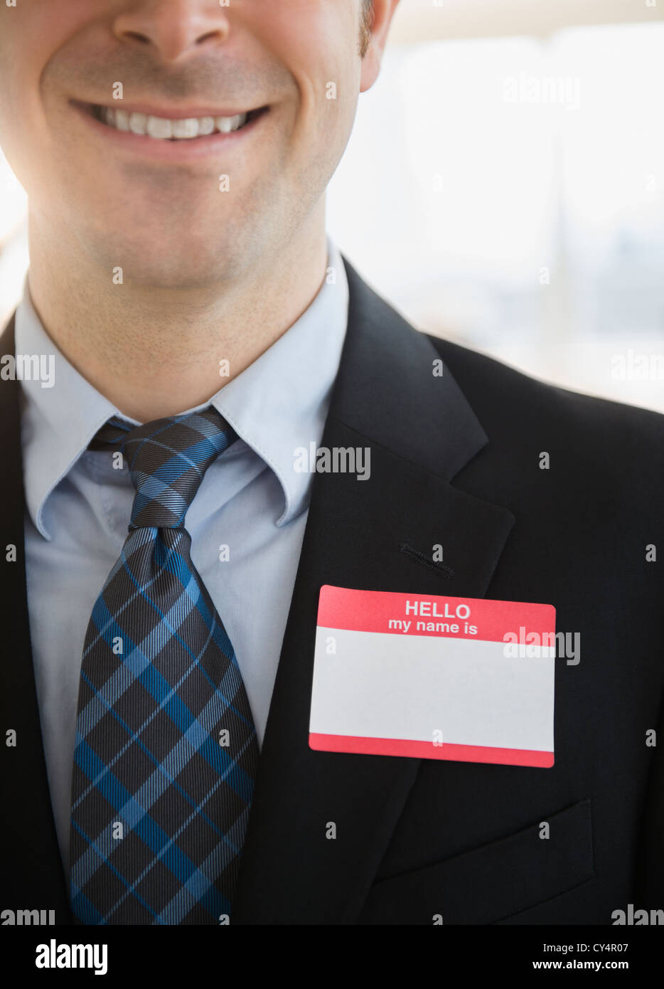 USA, New Jersey, Jersey City, Office worker with name tag on suit Stock