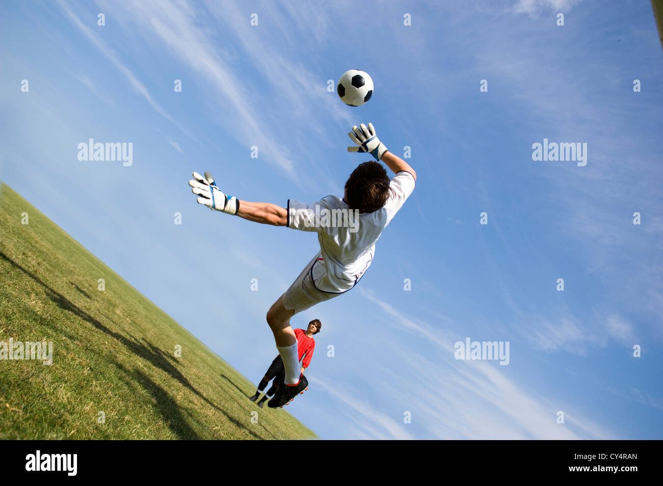 Soccer Football Goalie making diving save Stock Photo Alamy