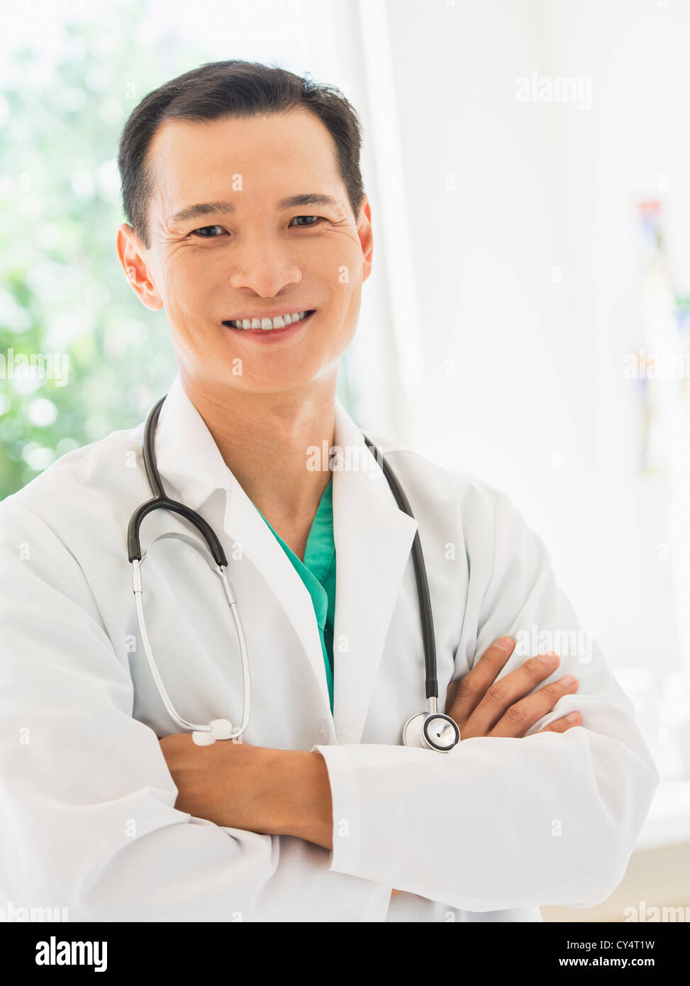 Portrait happy adult doctor hi-res stock photography and images - Alamy