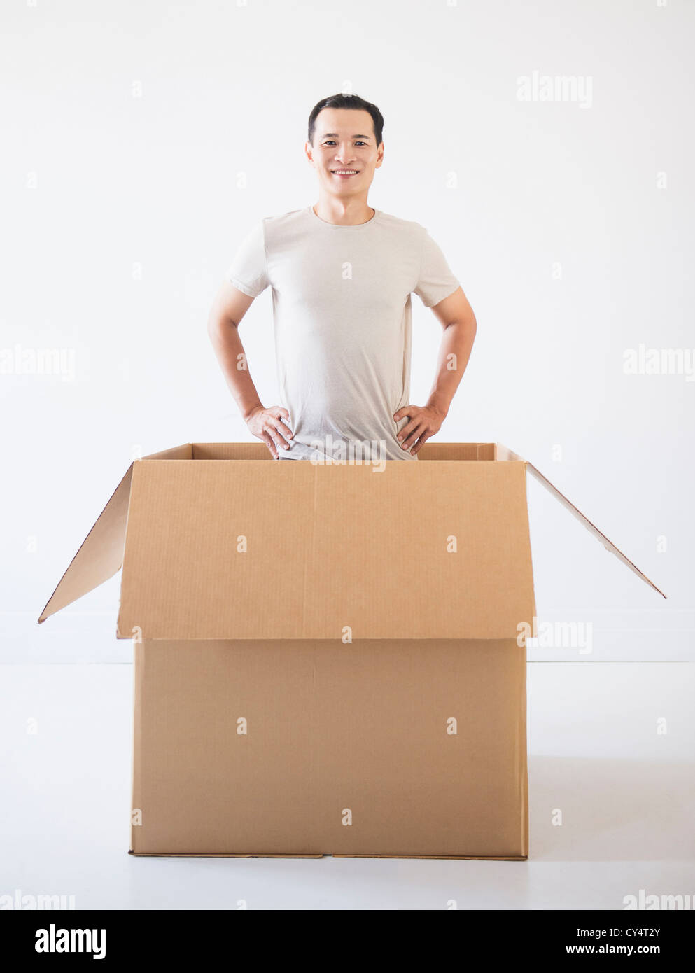 man popping out from cardboard box stock photo 51123155 alamy
