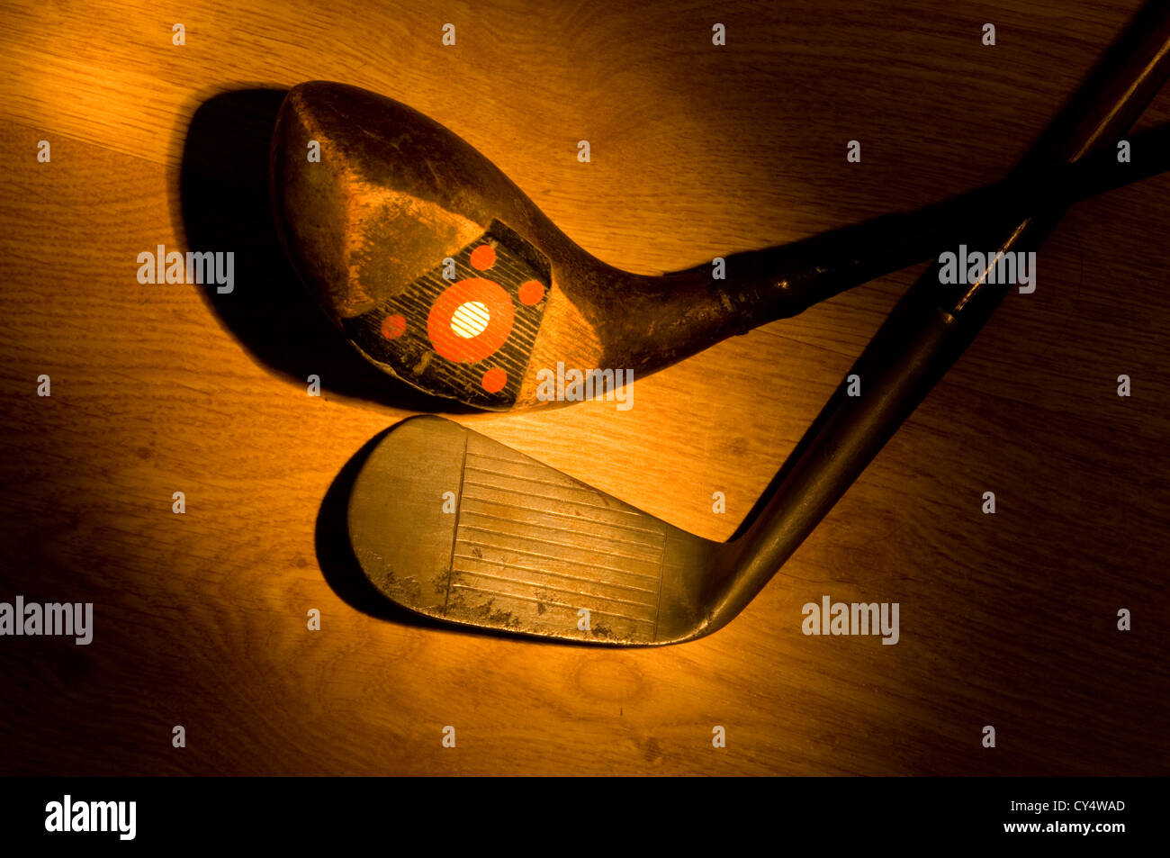 Old, vintage, antique golf clubs painted with light from a flashlight Stock Photo