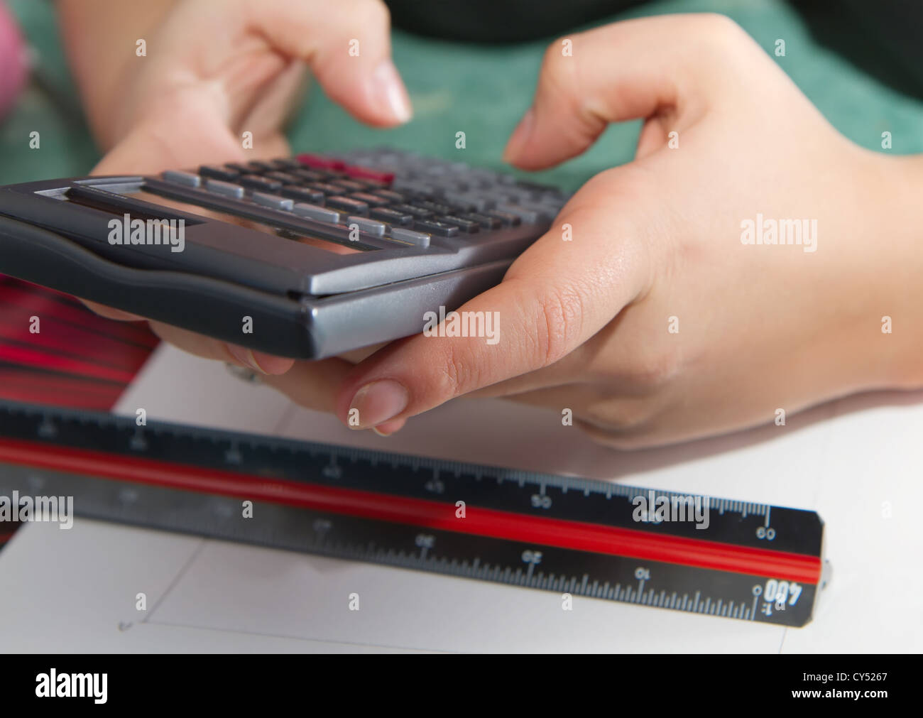 office work per calculator Stock Photo Alamy