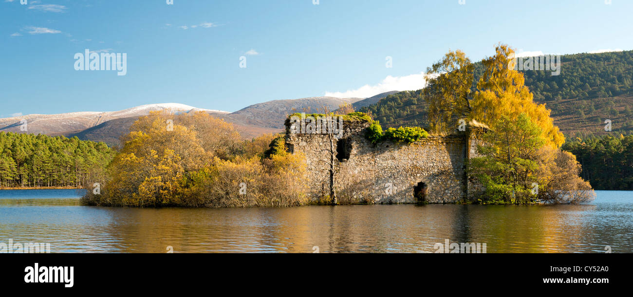A landscape photograph of Loch an Eilein castle in Autumn colours  it is located in the rothiemurchus estate in Aviemore Stock Photo