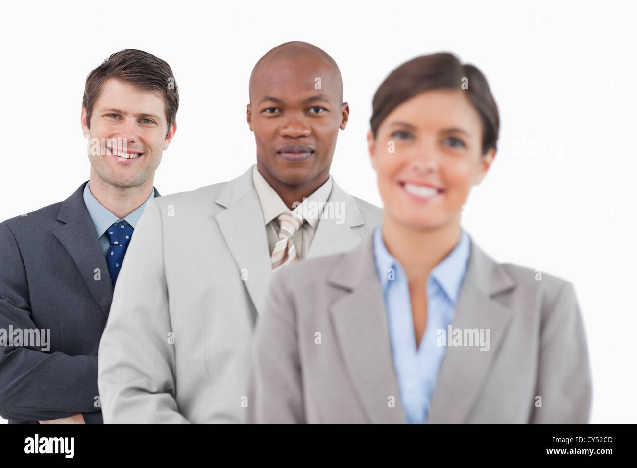 Young business people standing together Stock Photo - Alamy
