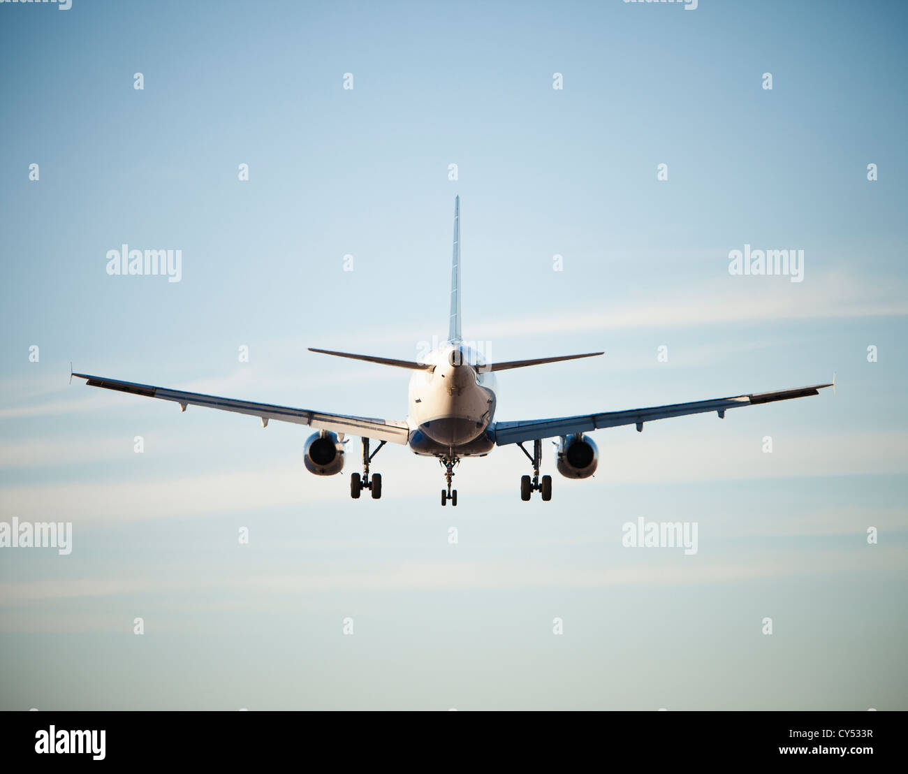 Tale end of jet airliner flying Stock Photo