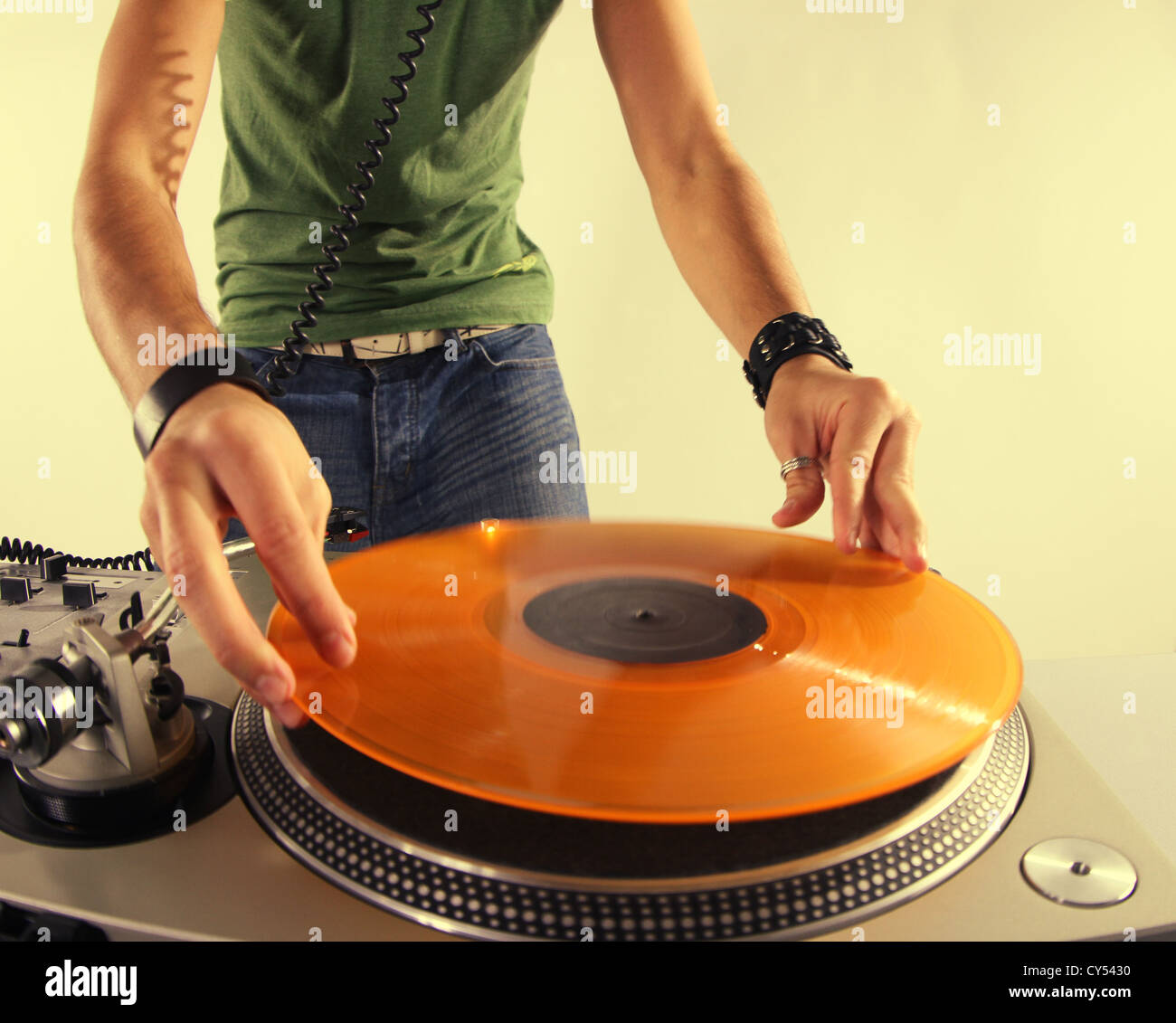 a cool male dj on the turntables Stock Photo