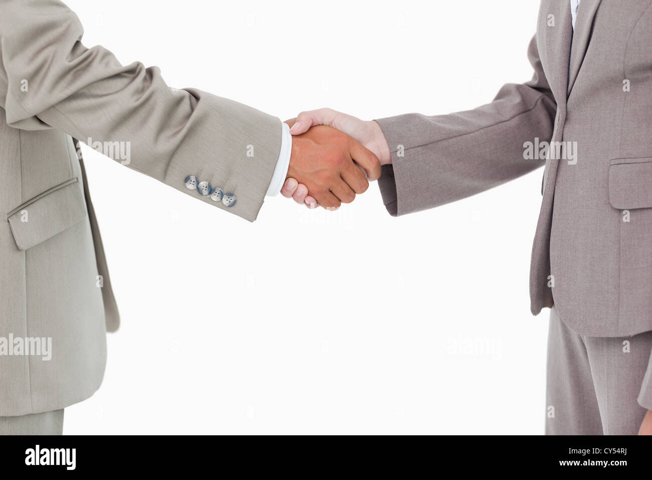 Side view of shaking hands Stock Photo