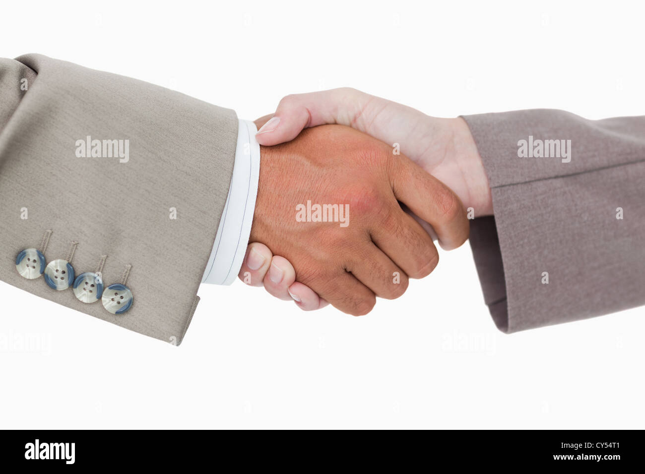 Side view of business peoples hands shaking Stock Photo
