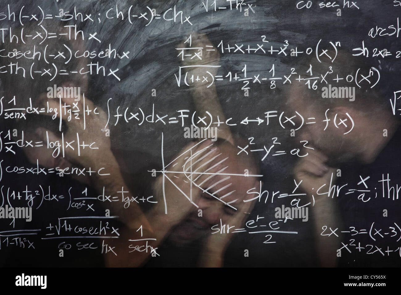 blackboard with math text and multi man portrait Stock Photo
