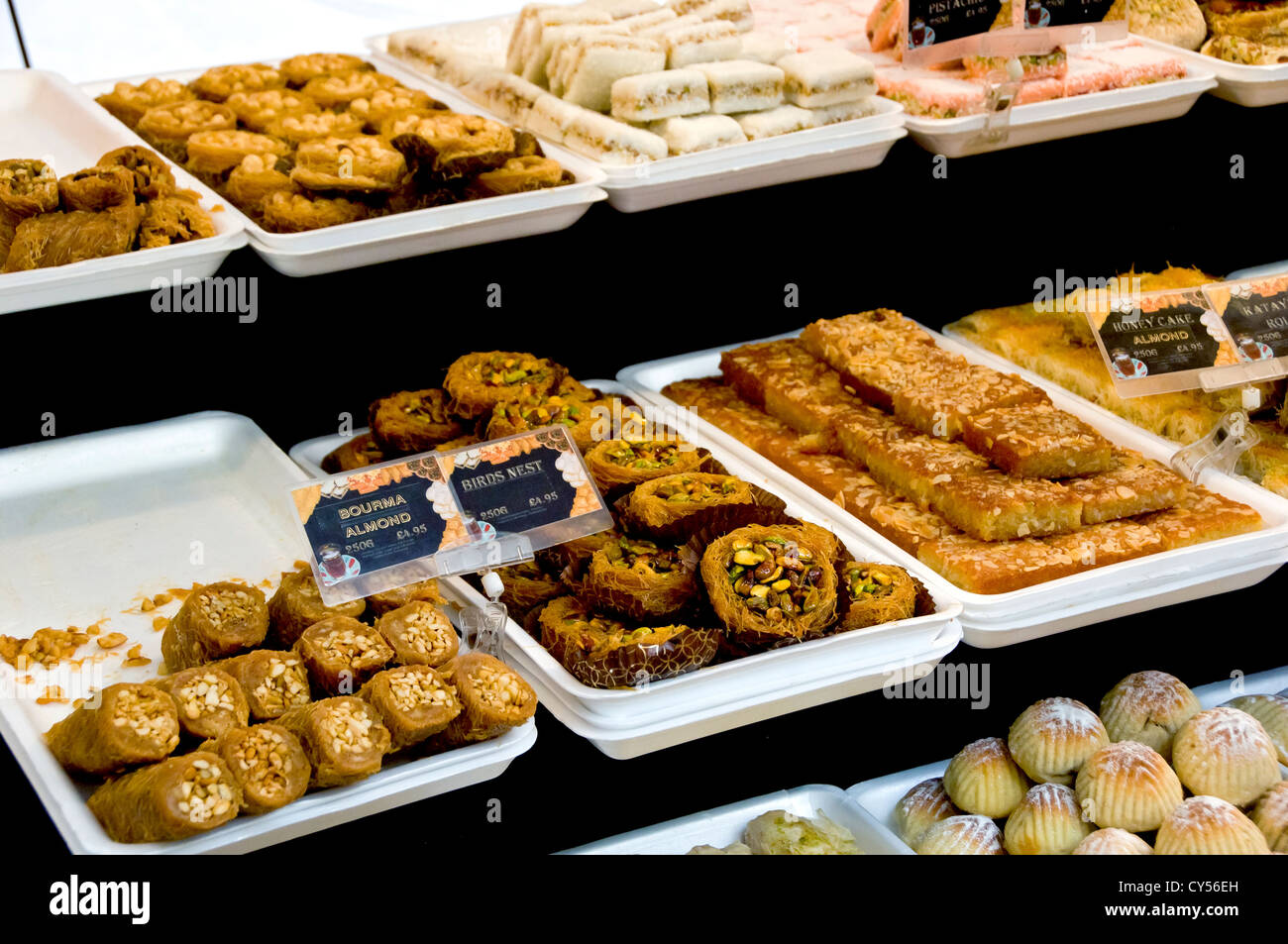 Fresh cakes and pastries for sale on continental bakery market stall York North Yorkshire England UK United Kingdom GB Great Britain Stock Photo