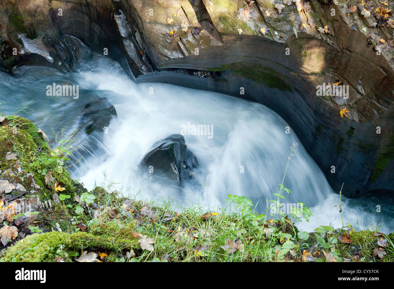 A fast flowing stream of glacial water, Flims, Graubunden, Switzerland Europe Stock Photo