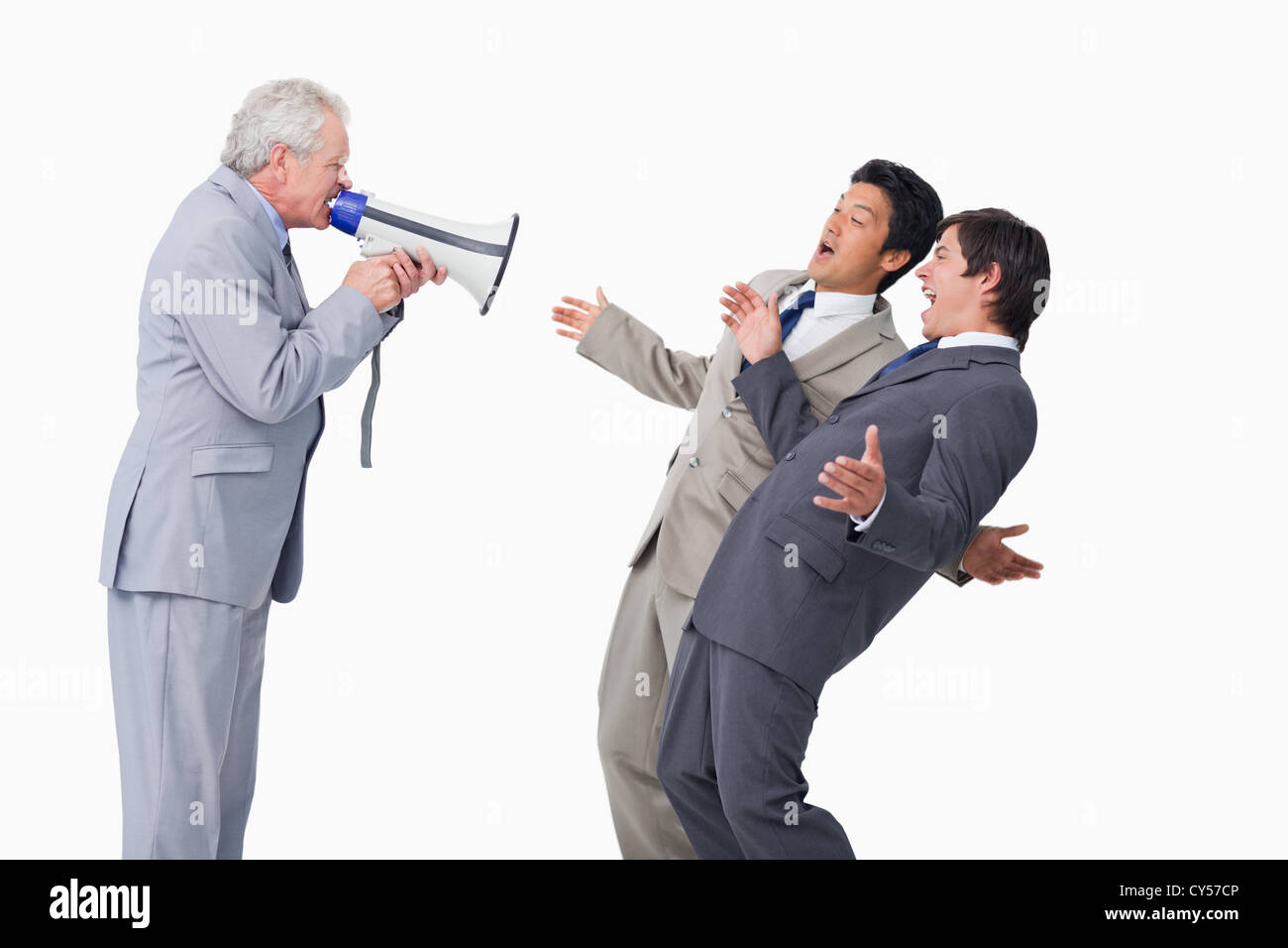 Senior salesman with megaphone yelling at his employees Stock Photo - Alamy