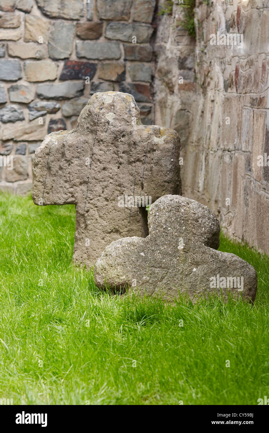 Old medieval tomb and stone cross Stock Photo