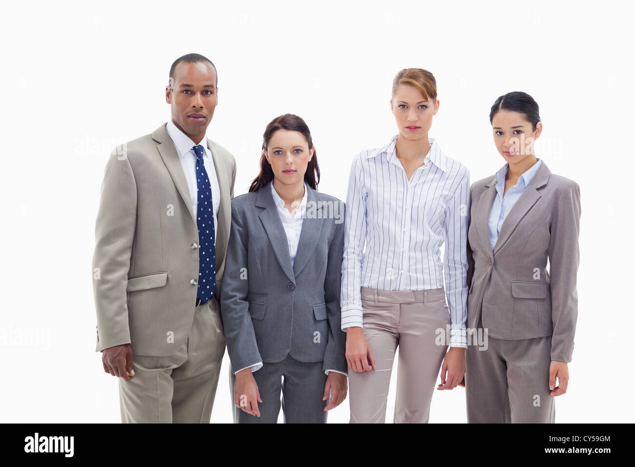 Serious business team standing side by side Stock Photo - Alamy