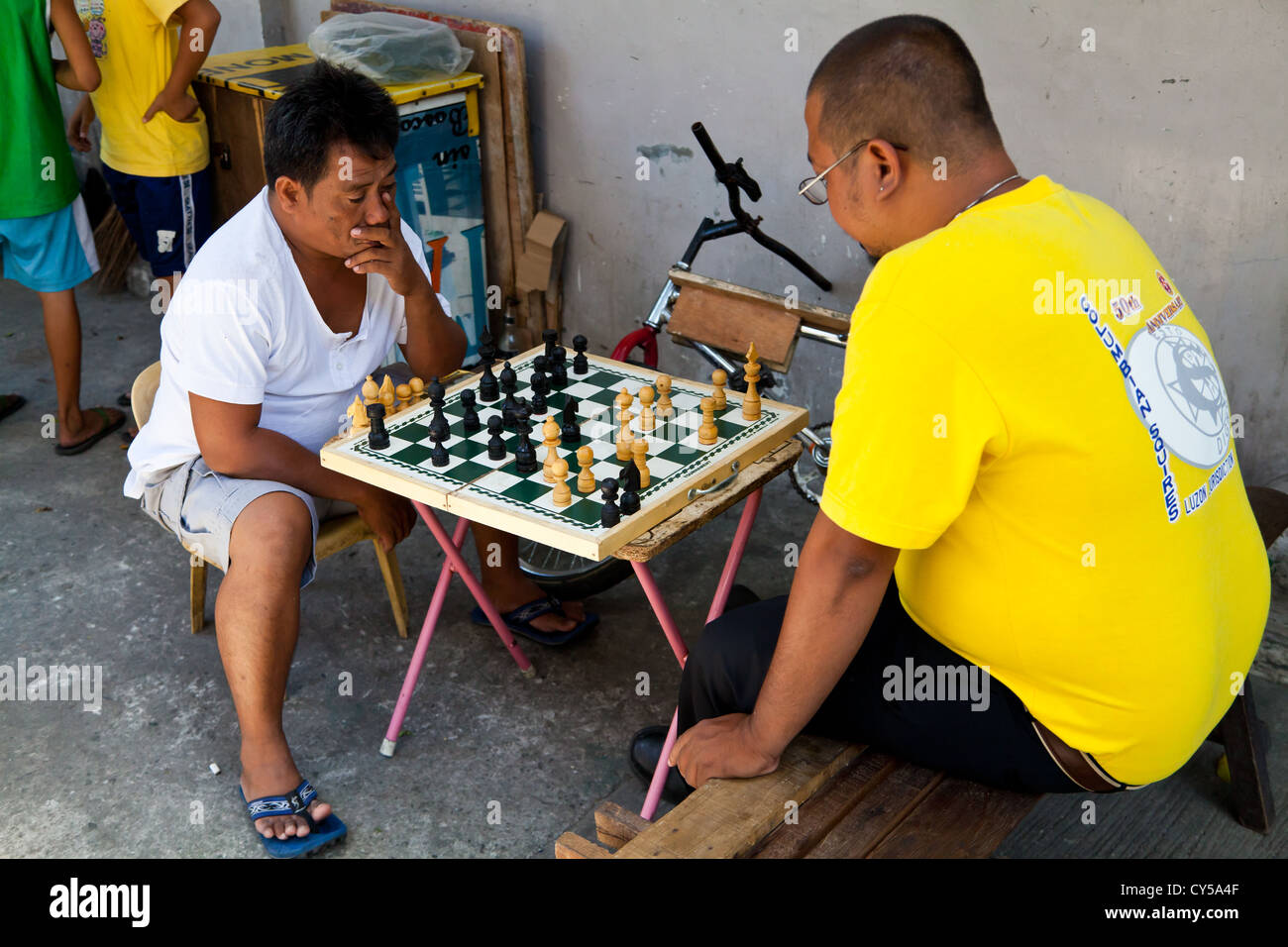 Filipino Elderly Men Play Chess Next Editorial Stock Photo - Stock Image