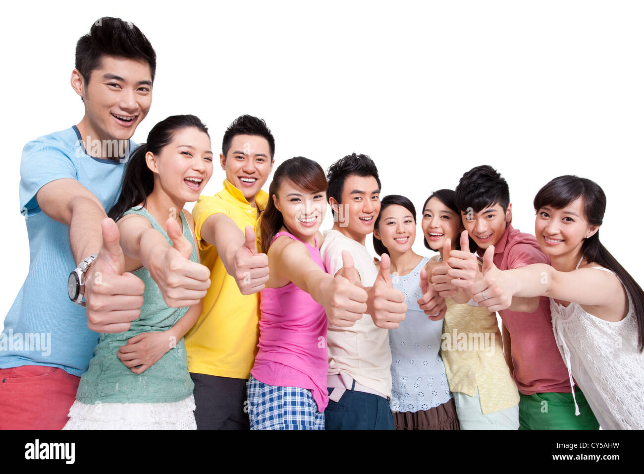 Group of young people showing thumbs up Stock Photo - Alamy