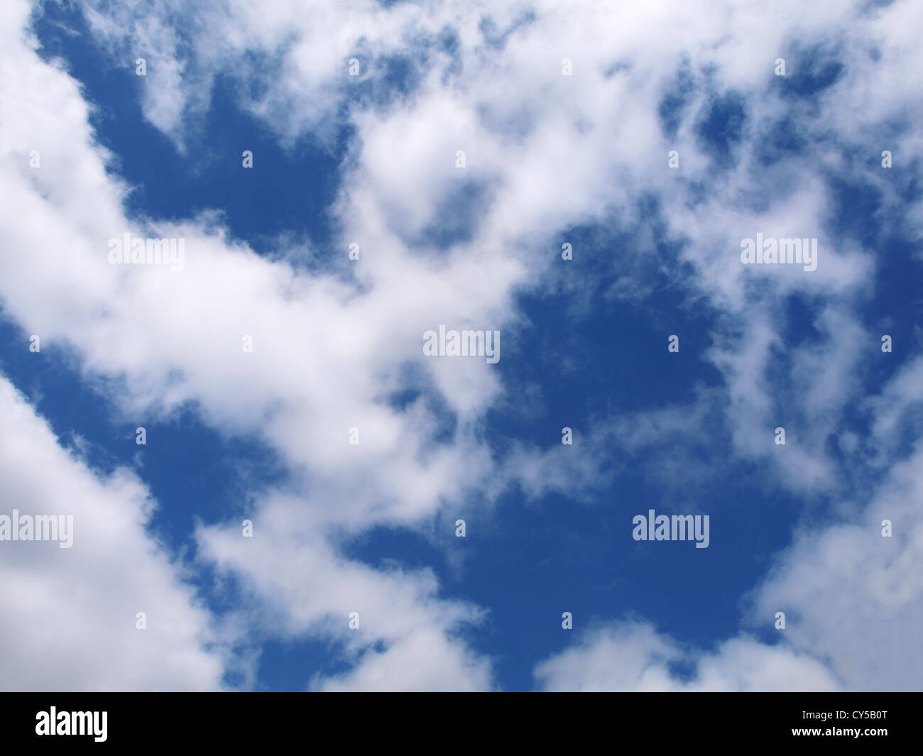 an abstract blue sky background with fluffy white clouds Stock Photo ...