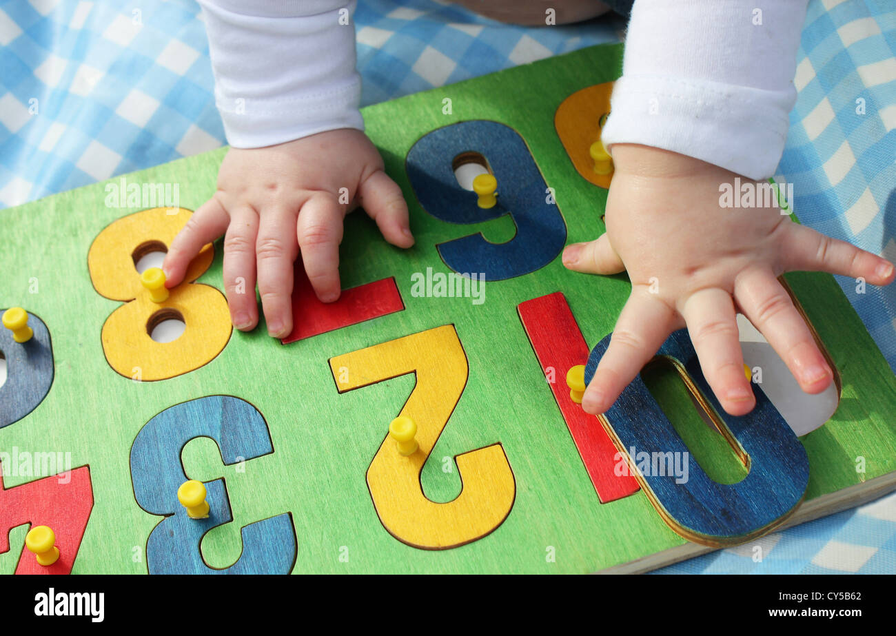 Child Using Numbers Child learning numbers hi-res stock photography and images - Alamy