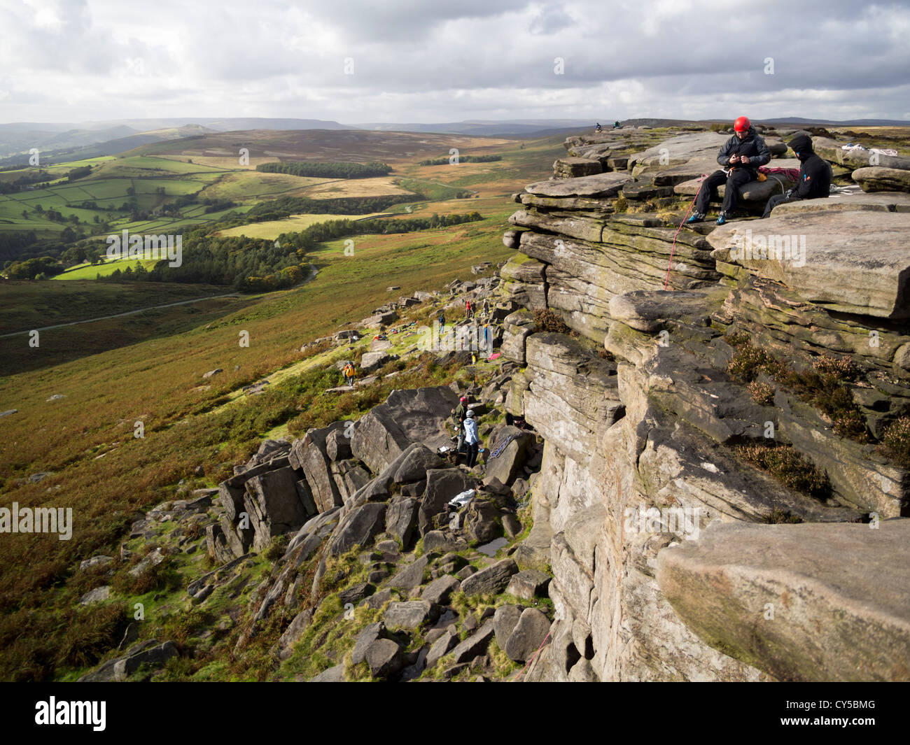 Rock Climber On Stanage Edge In The Peak District National Park In rock-climber-on-stanage-edge-in-the-peak-district-national-park-in