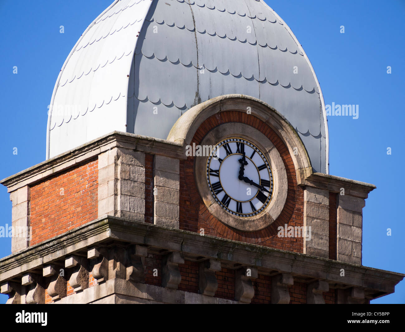 Chesterfield market hall clock tower with clock face showing 12.15pm