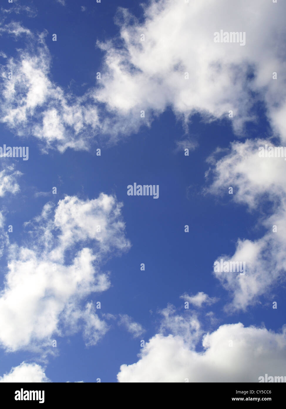 an abstract blue sky background with fluffy white clouds Stock Photo ...