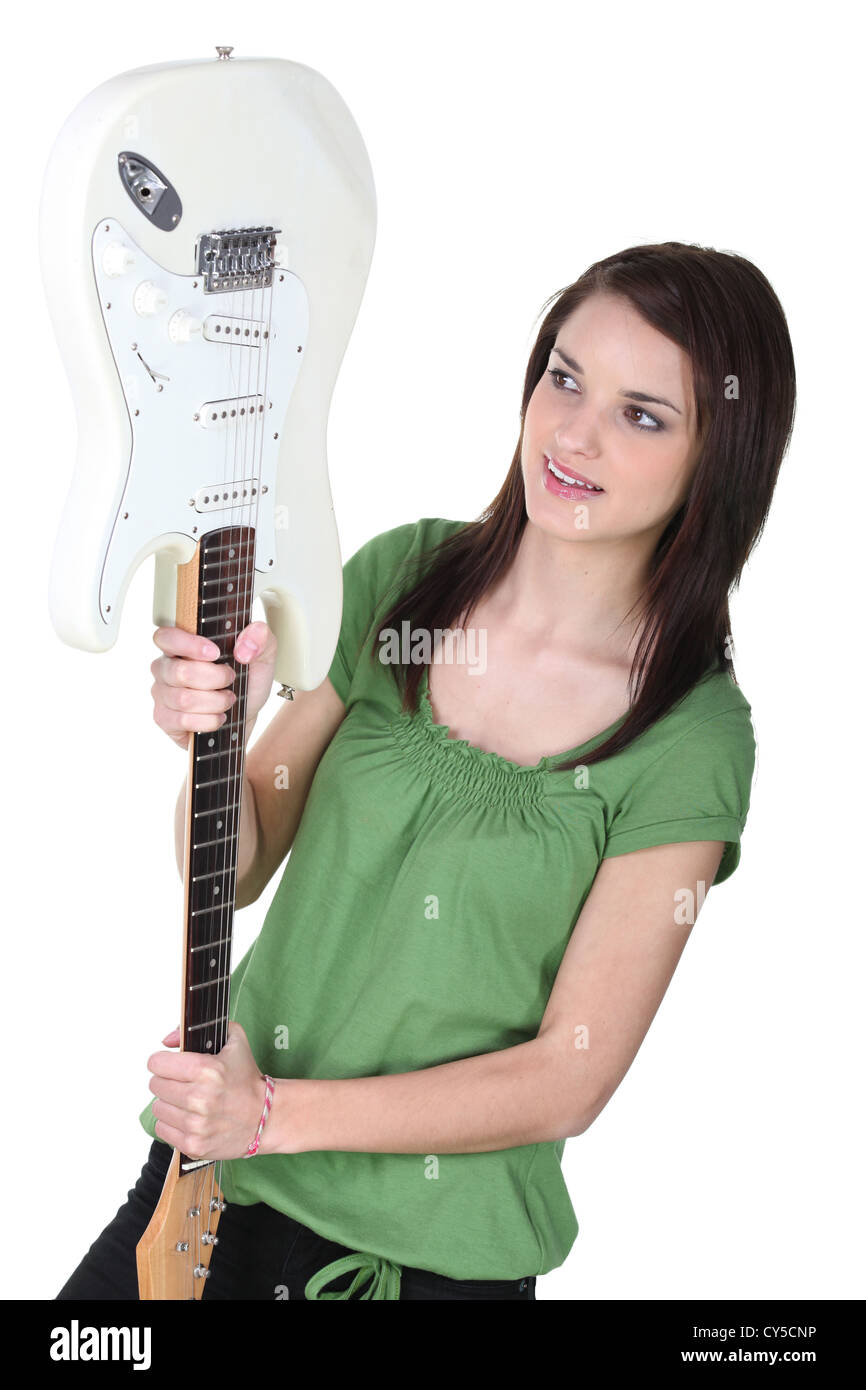 Girl holding guitar Stock Photo - Alamy