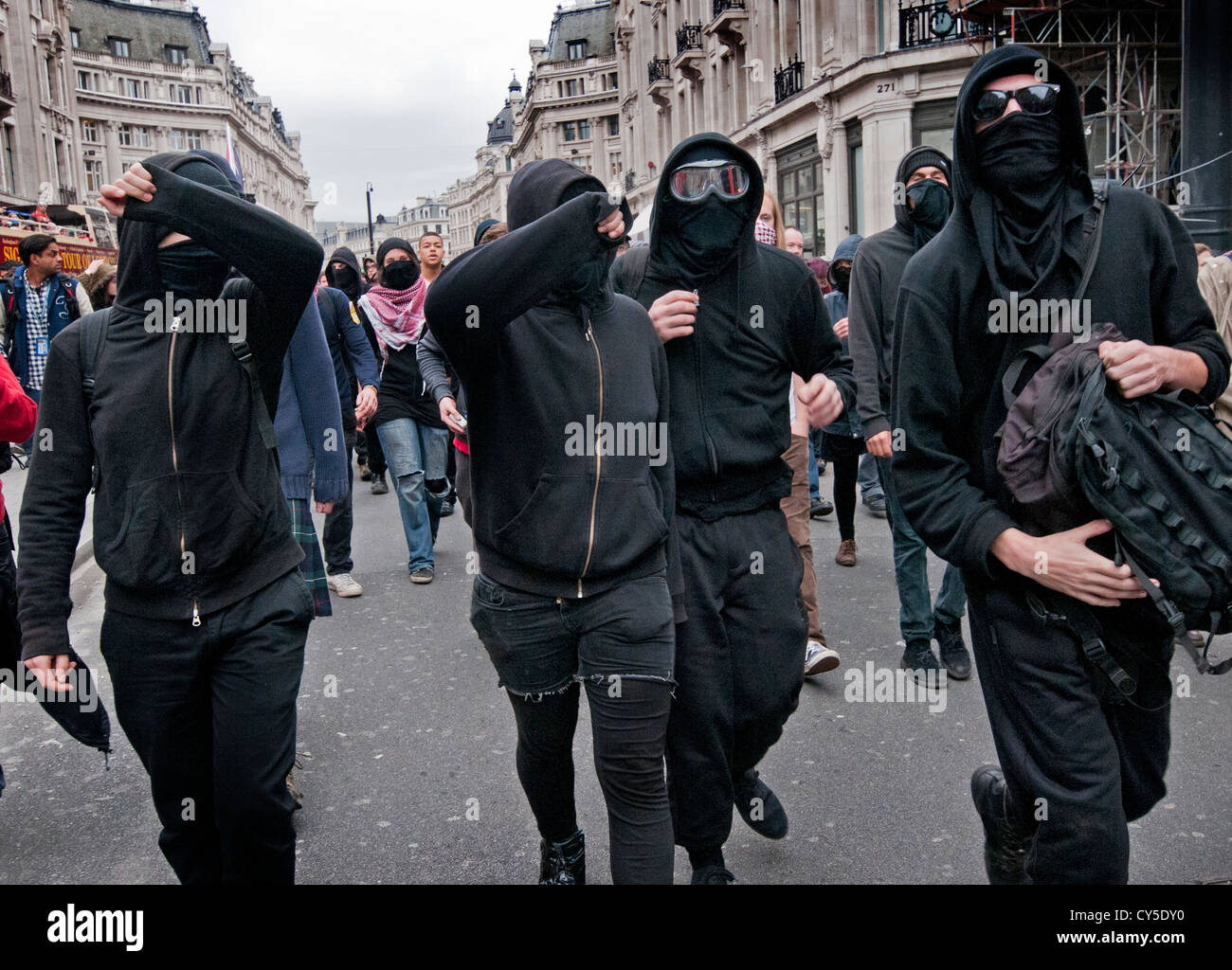 Anarchist Black Bloc  disrupt Anti-austerity and anti cuts  protest organized by the TUC  marched through Central London Oct 201 Stock Photo